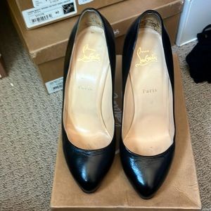 Christian Louboutin black pumps
